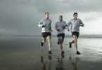 Runners on beach